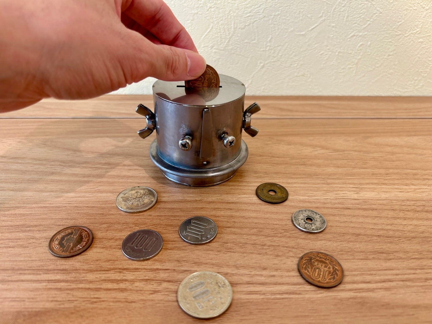 Unretrievable piggy-bank made of stainless steel handmade by craftman Japan