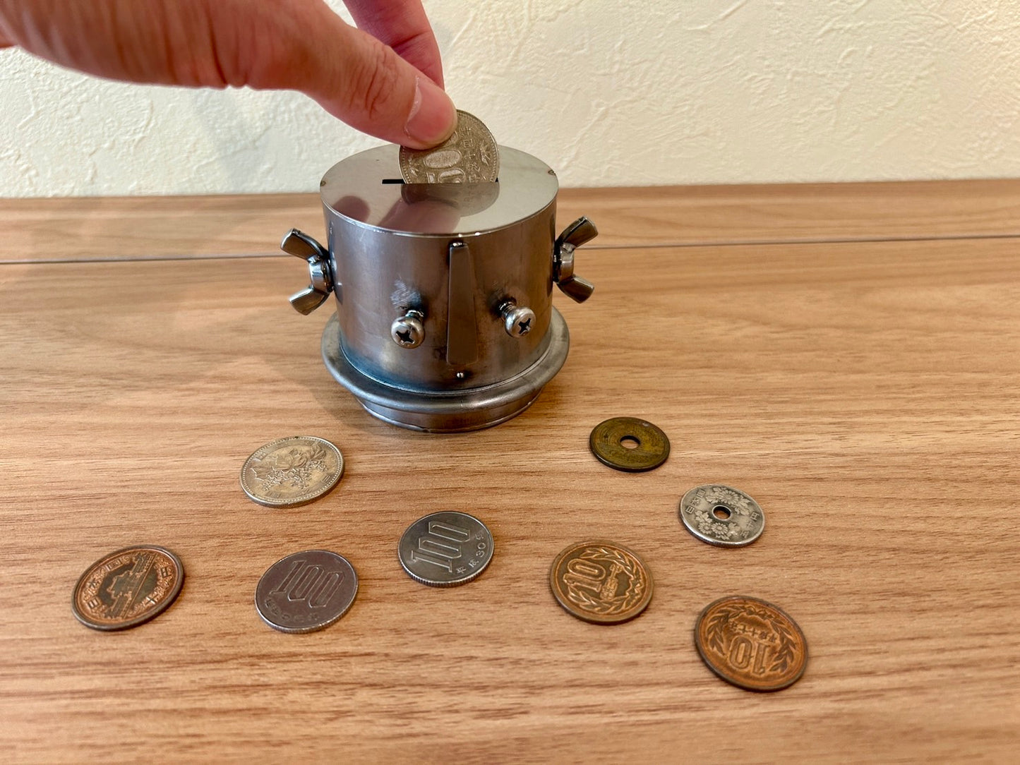 Unretrievable piggy-bank made of stainless steel handmade by craftman Japan