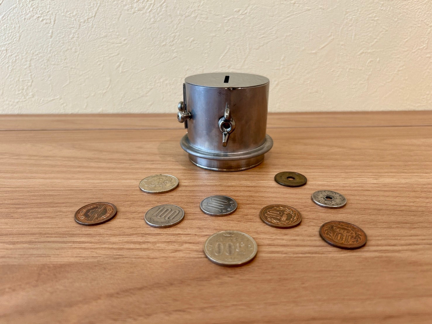 Unretrievable piggy-bank made of stainless steel handmade by craftman Japan