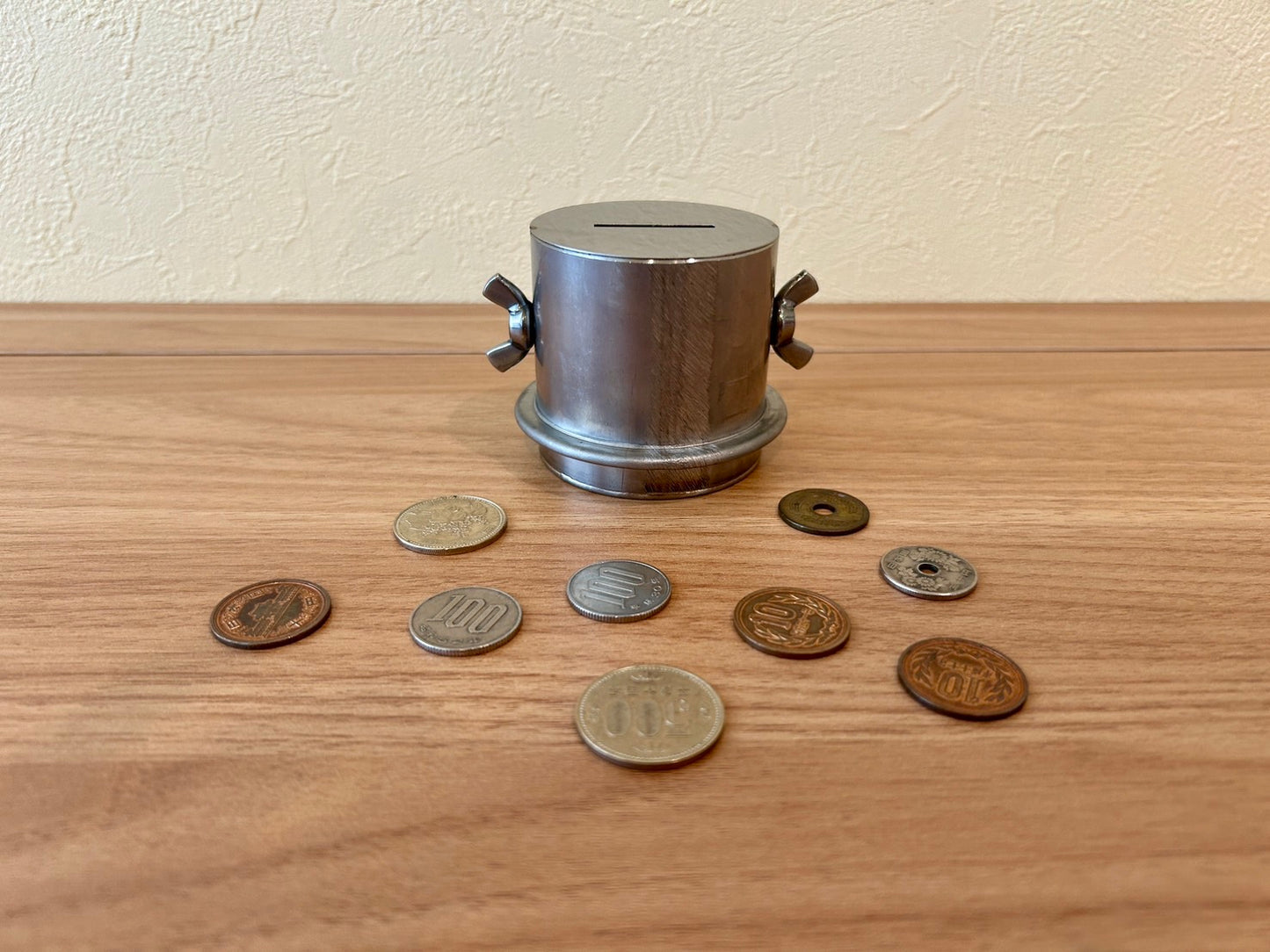 Unretrievable piggy-bank made of stainless steel handmade by craftman Japan