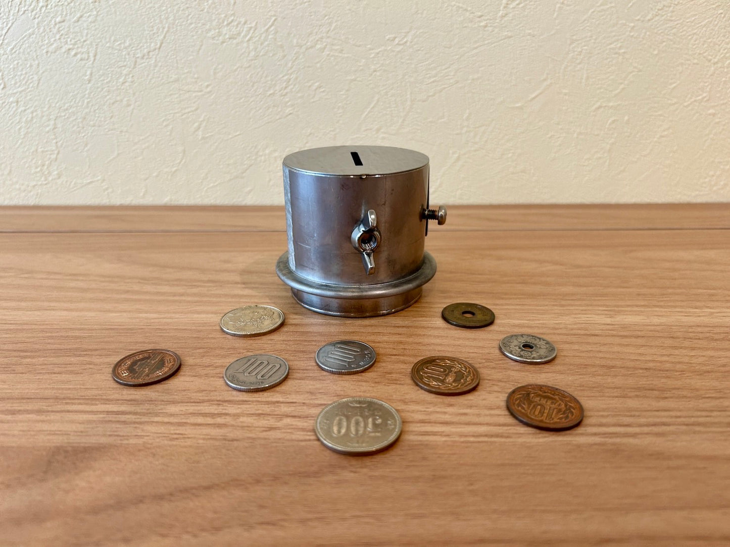 Unretrievable piggy-bank made of stainless steel handmade by craftman Japan