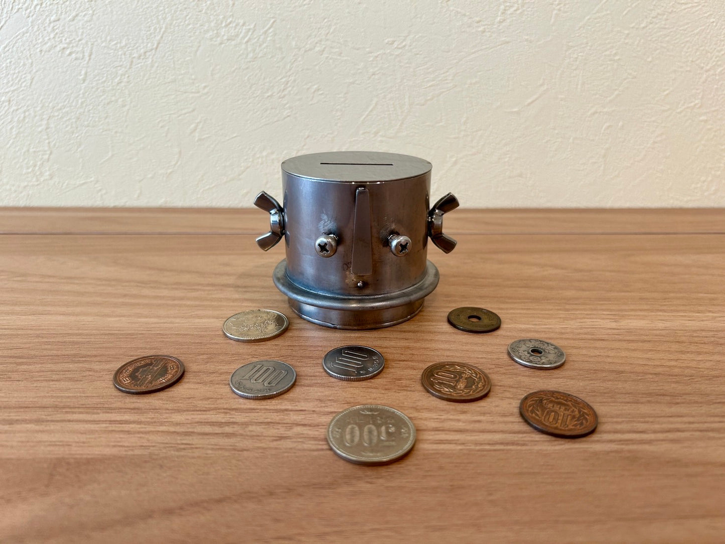 Unretrievable piggy-bank made of stainless steel handmade by craftman Japan